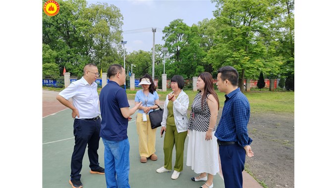 火苗助学基金会捐建三塘联校雁西小学绿化工程完工验收